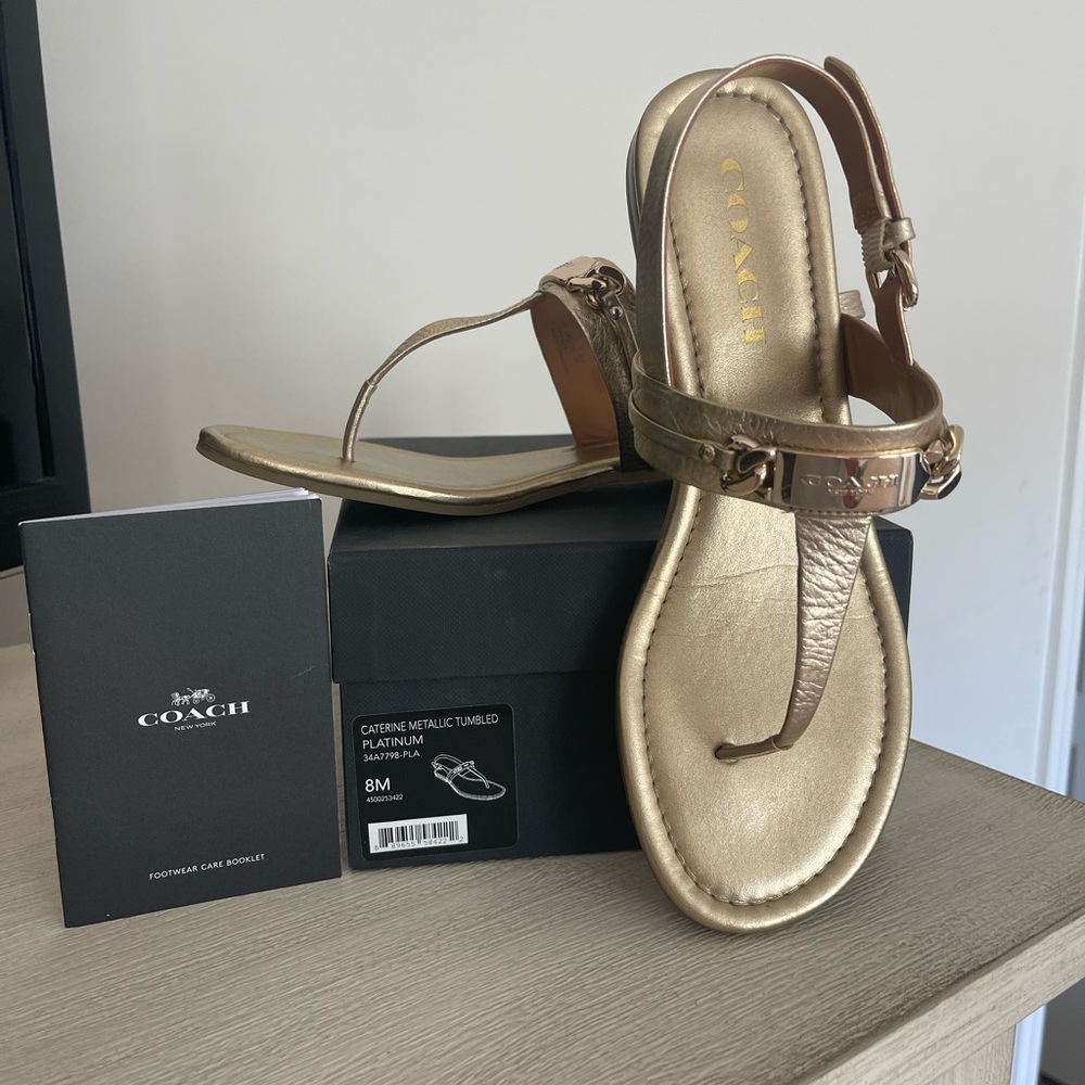 Size 8 gold Coach sandals